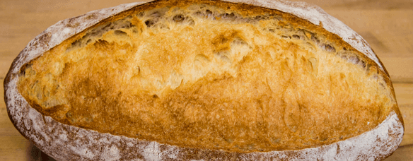 top photo of handmade french bread made with a preferment of poolish and levain